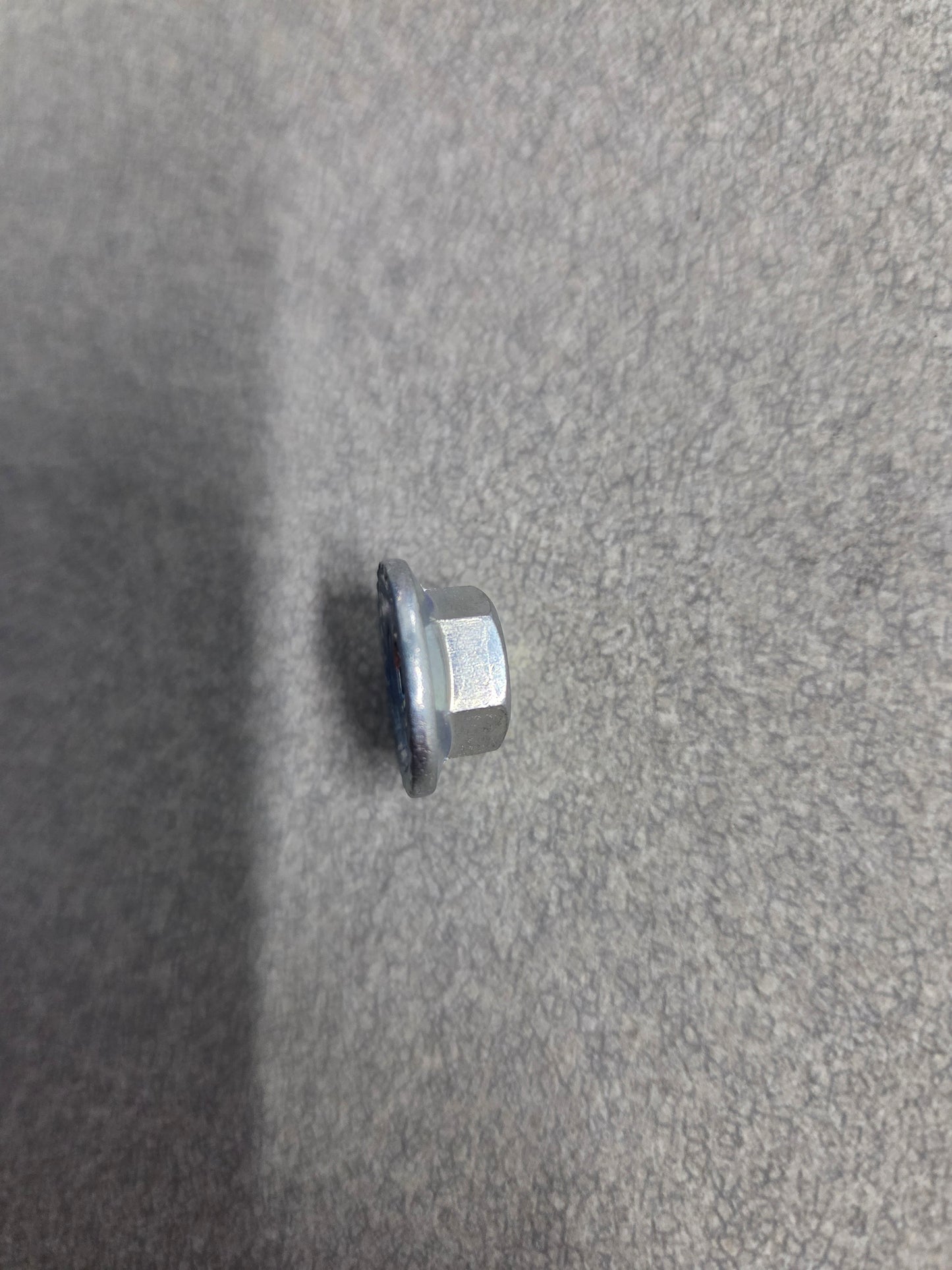 Mahindra Battery Hold Down Flange Nut F3000106011